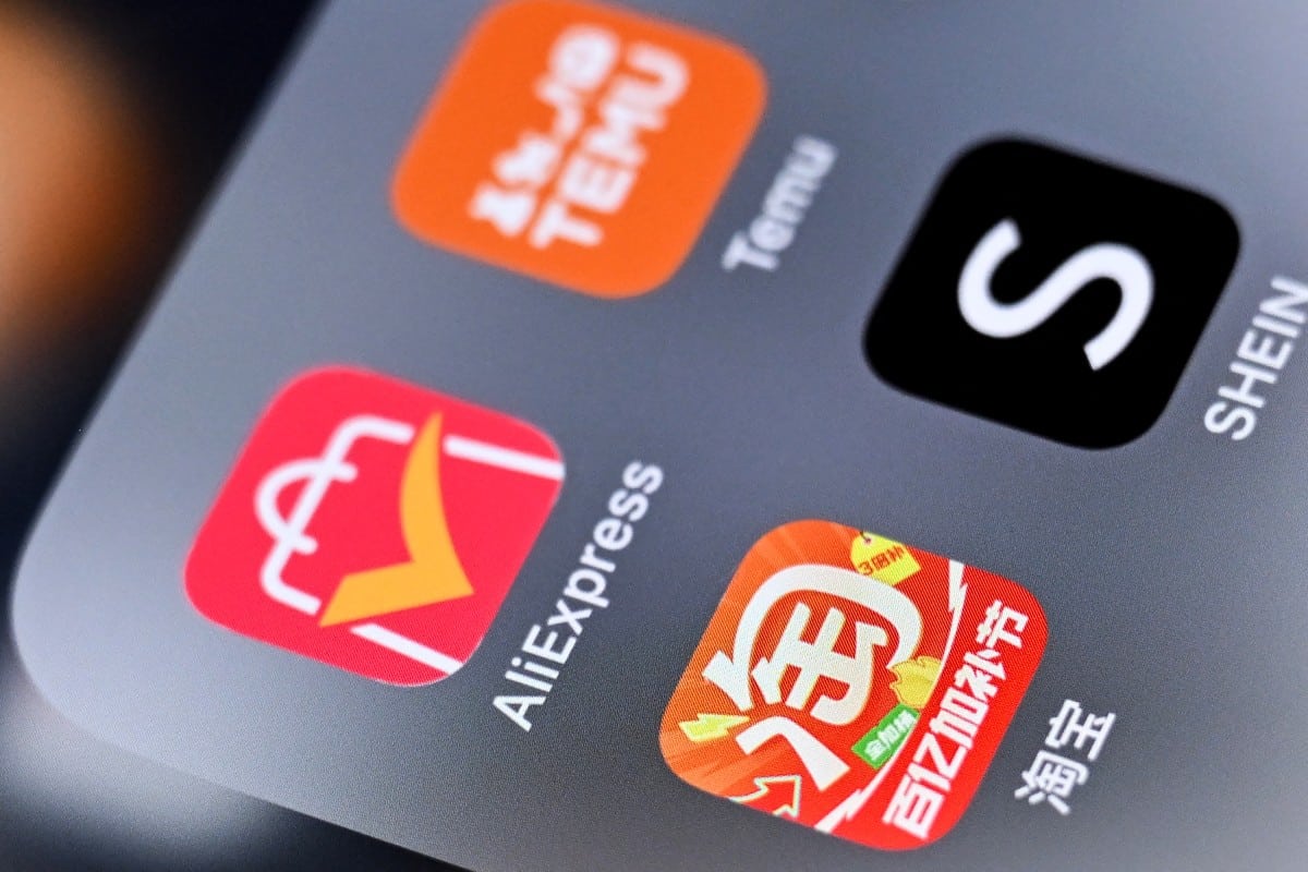 An illustration photo taken on April 24, 2025 shows the logos of Chinese mobile apps Taobao, AliExpress, Shein and Temu on a smartphone screen.