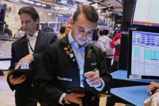 Wall Street rises on Microsoft and Meta Platforms lead